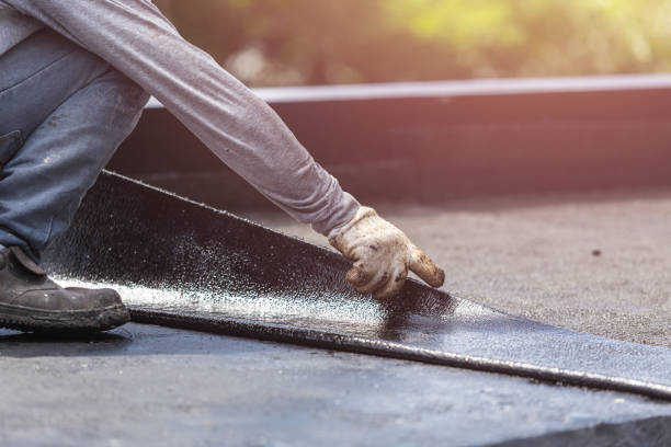Professional Basement Waterproofing technician working in Lake LeAnn, MI